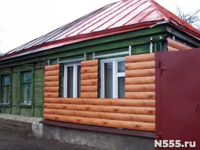 Наружная обшивка старого дома профлистом, сайдингом